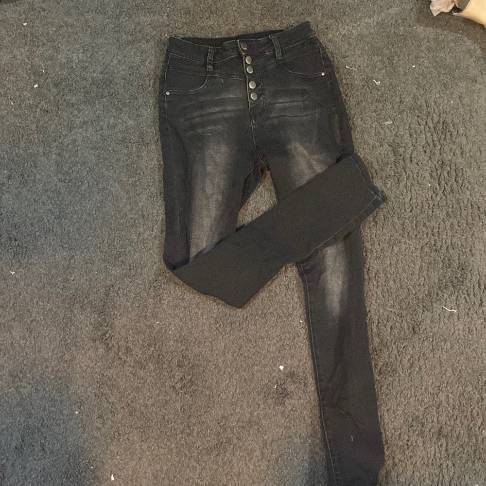 Distressed black five button high waisted skinny jeans